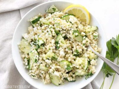 Lemony Cucumber Couscous Salad is a light, fresh, and vibrant pasta salad perfect for any summer meal. BudgetBytes.com