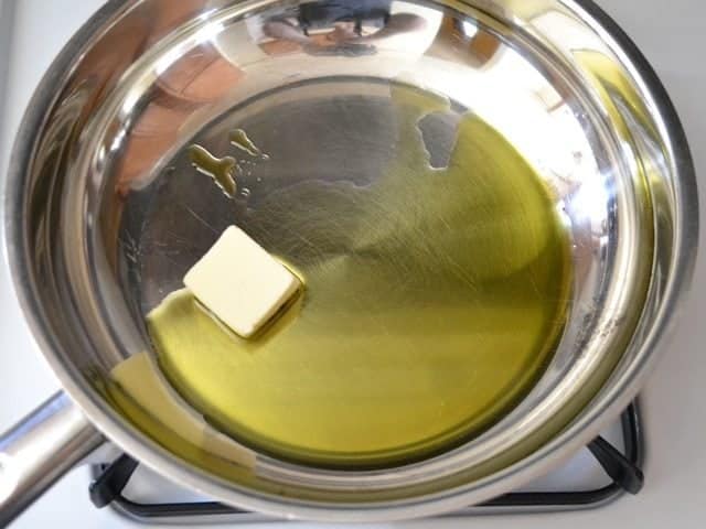 oil and butter in skillet on stove top 