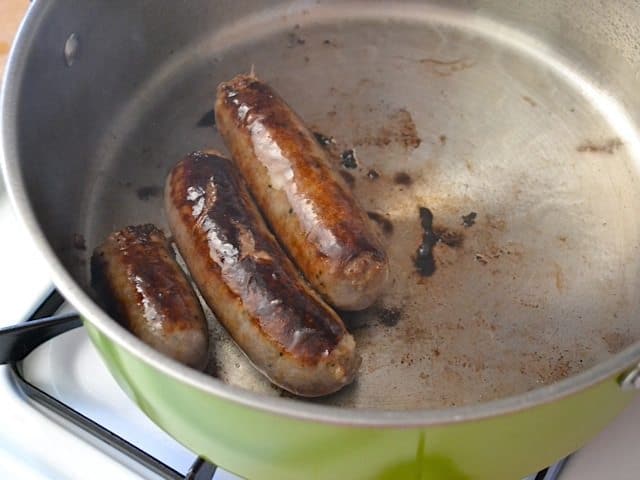 Cooking Sausage in pot 