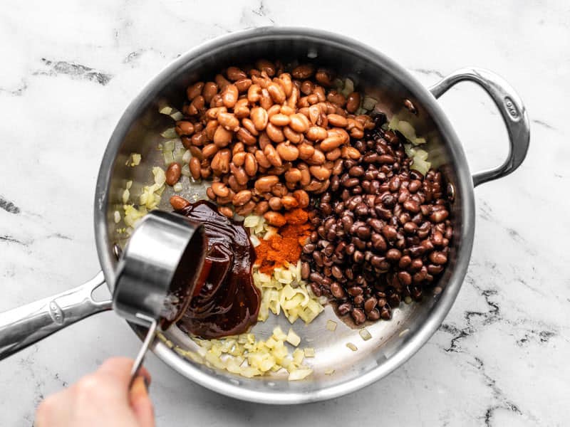 Add Beans BBQ Sauce and Smoked Paprika to the skillet