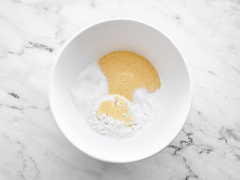 Cornbread dry ingredients in a white bowl