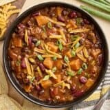 Overhead view of a bowl of chorizo sweet potato chili.