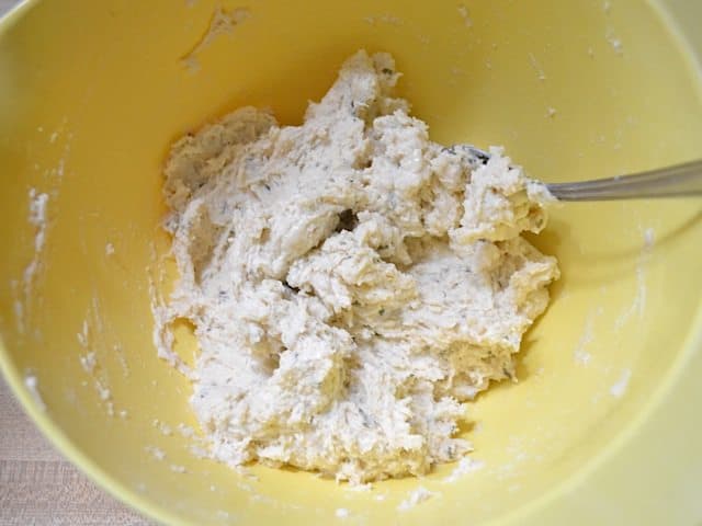 Dough mixed together in mixing bowl 