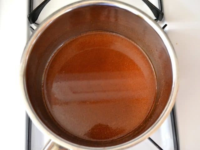 Sriracha Glaze in pot on stovetop 