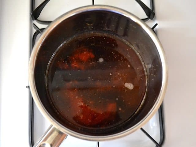 Glaze Ingredients in pot on stovetop 