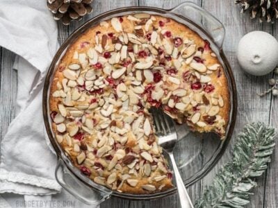 This Cranberry Almond Cake is super fast to prepare and the perfect festive dessert for the holiday season. BudgetBytes.com