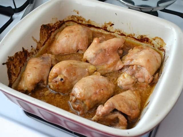 Baked Chicken Thighs in baking dish 