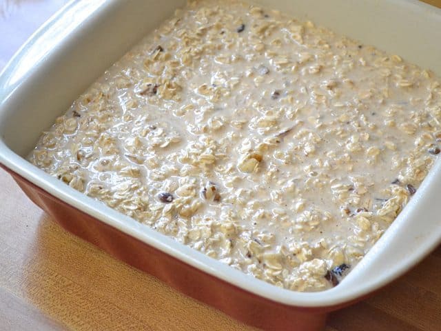 Oatmeal mixture poured in baking pan ready to Bake