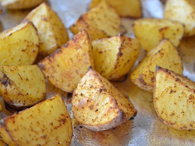 Close up of Roasted Potatoes on baking sheet 