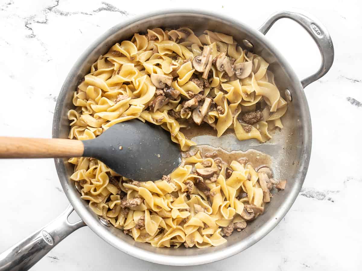 Cooked noodles with beef in the skillet
