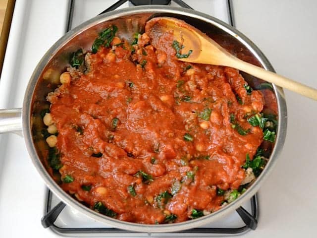 Marinara sauce added to skillet 