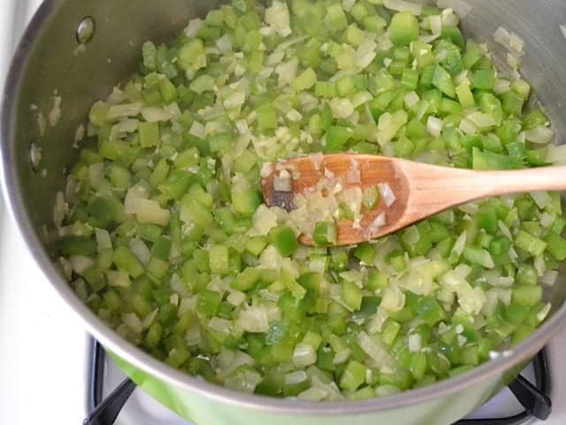Saute vegetables in pot 