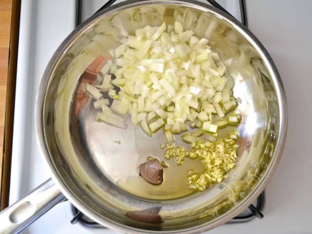Onion, Garlic, Anchovy paste, cooking in skillet 