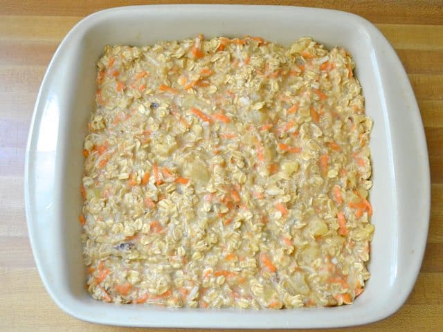 Oatmeal mixture poured into casserole dish, ready to bake 