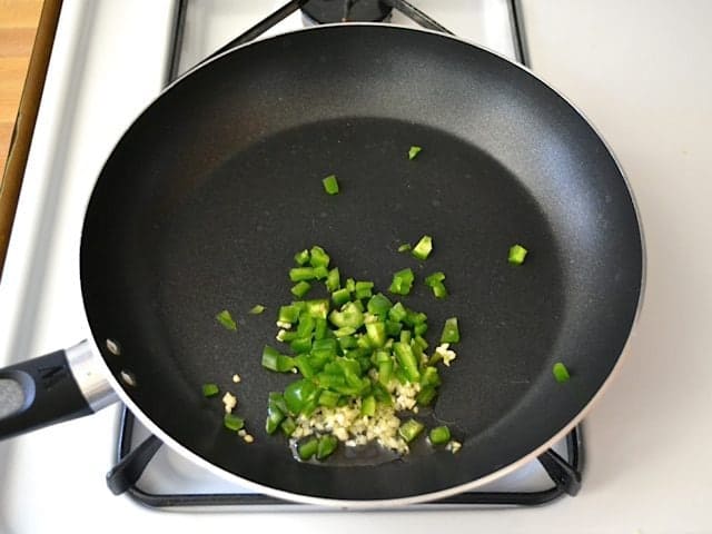 Jalapeno and Garlic in skillet 