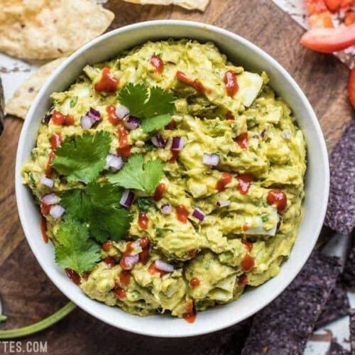 This unique blend of sweet pineapple, spicy sriracha, zesty red onion, creamy avocado, and rich hard boiled eggs makes this the Best Ever Avocado Dip. You'll never eat plain guacamole again. BudgetBytes.com