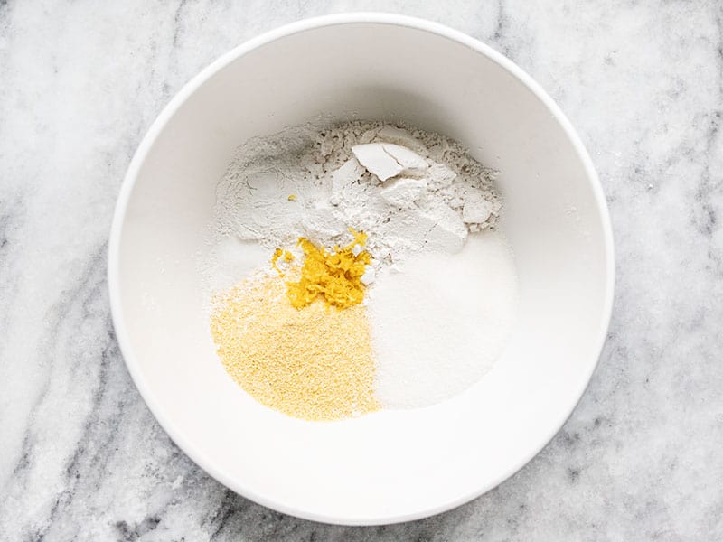 Dry ingredients for lemon blueberry cornbread in a bowl. 