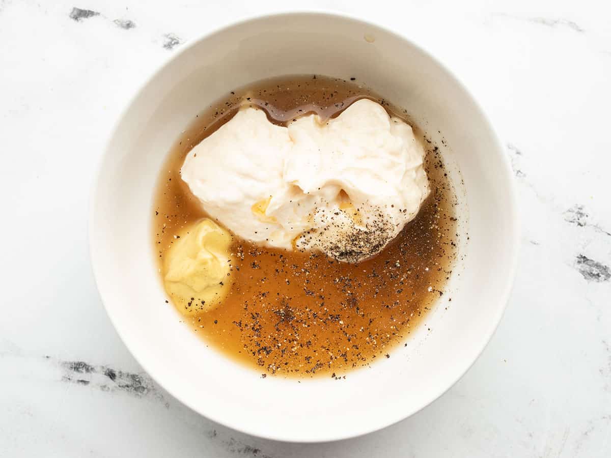 Salad dressing ingredients in a bowl