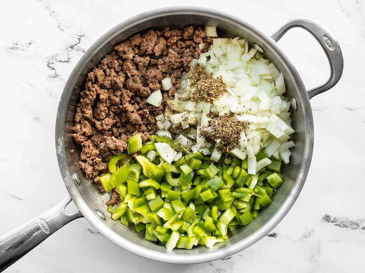browned ground beef with diced onion, bell pepper, and herbs