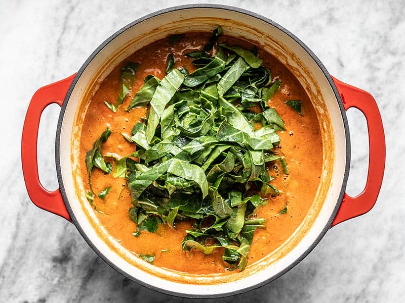 Add Collard Greens to Simmered Stew