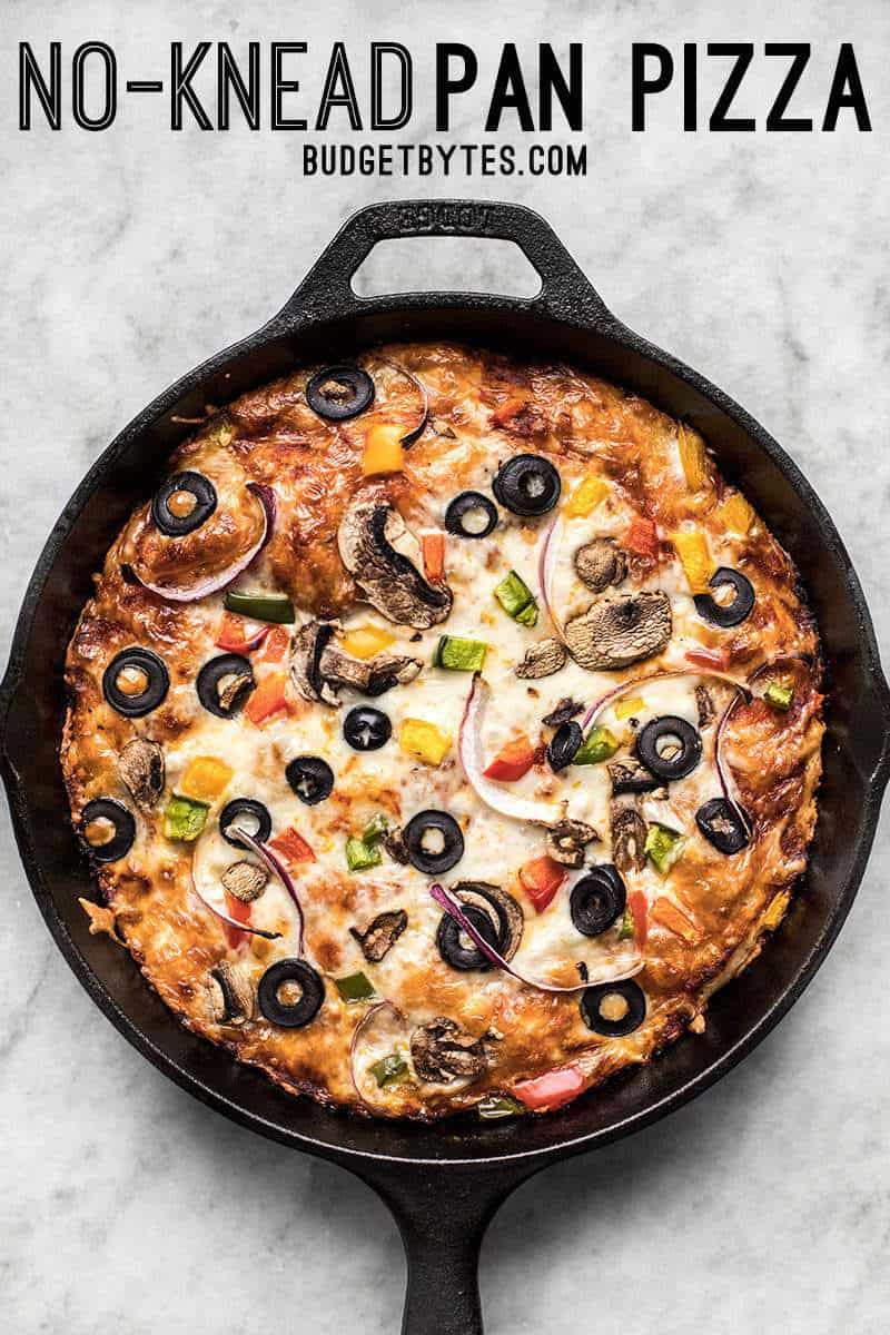 A simple overnight no knead dough makes a perfectly crispy yet thick crust on this no knead pan pizza. Deep dish pan pizza has never been easier. BudgetBytes.com