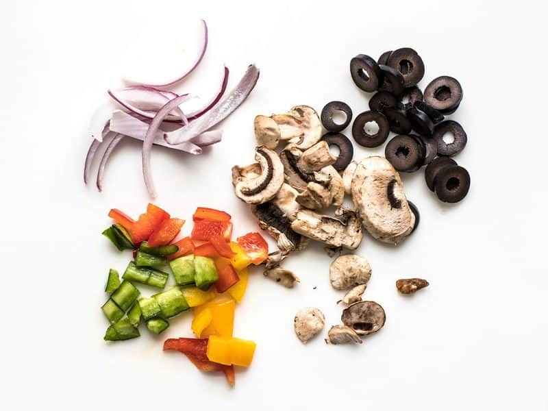 Salad Bar Pizza Toppings on counter 