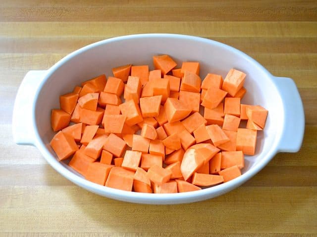 Cubed Sweet Potatoes in bottom of casserole dish 