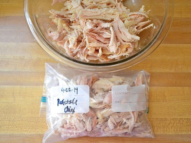 Some of the shredded chicken placed in a zip lock bag to freeze for later 