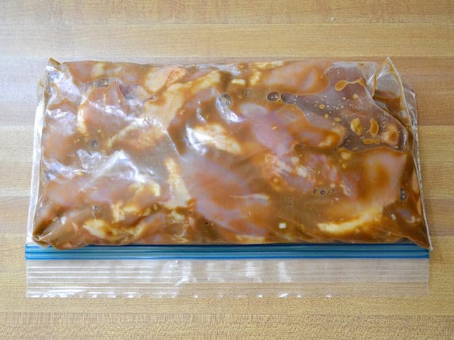 Chicken Thighs and marinade in zip lock bag 