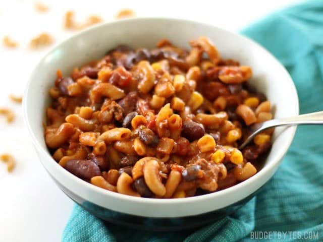 One Pot Chili Pasta is fast, easy, full of good-for-you beans and vegetables, and just enough cheese to feel like comfort food. BudgetBytes.com