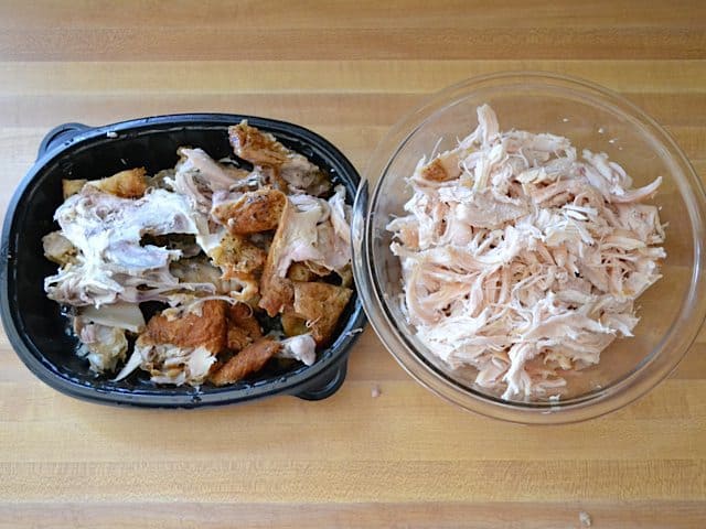 Pre cooked chicken pulled off the bone and shredded and placed in bowl 