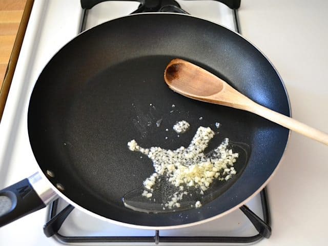 Sauté Garlic in skillet on stove top 