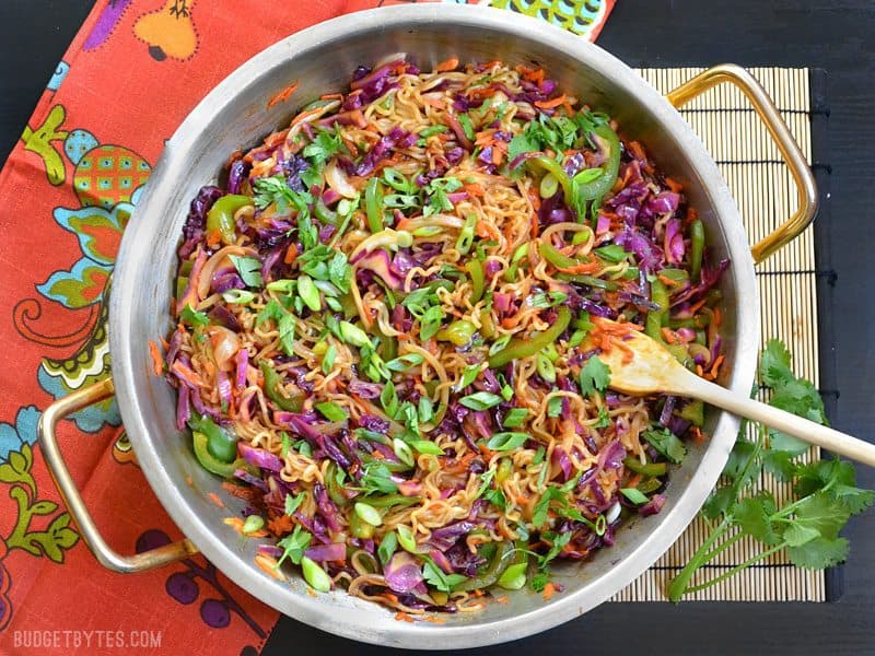 Top view of vegetable stir dry with noodles in skillet 