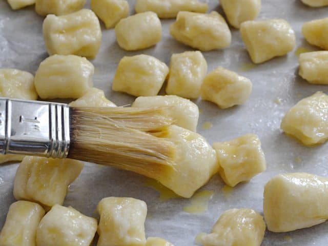 Pretzel bites put back on baking sheet and brushed with egg wash