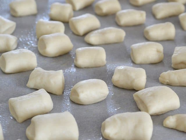Pretzel bits placed on baking sheet lined with parchment paper 
