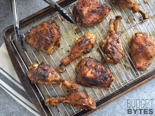 Cooked Slow Cooker 5 Spice Chicken on a baking sheet 