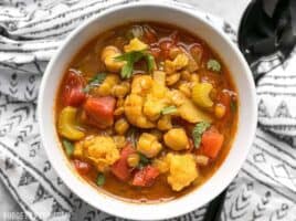 Warm intoxicating spices make this vegetable filled Moroccan Lentil and Vegetable Stew perfect for cold Autumn nights. BudgetBytes.com