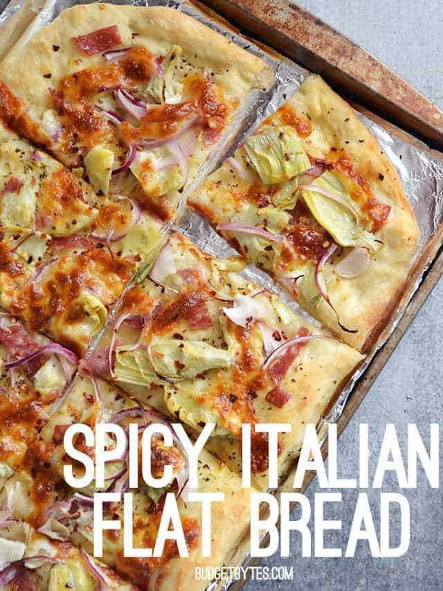 Spicy Italian Flat Bread on baking sheet lined with tin foil 