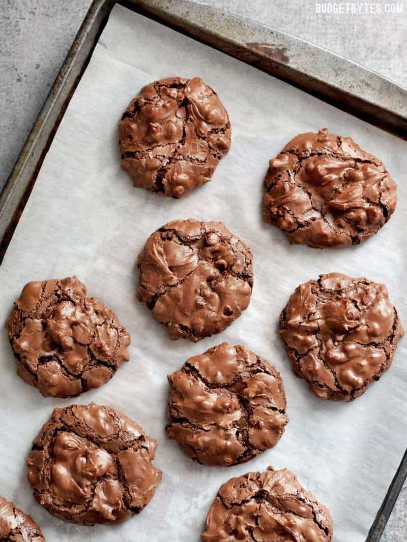 Baked Chocolate Cayenne Crinkles on a baking sheet lined with parchment paper 