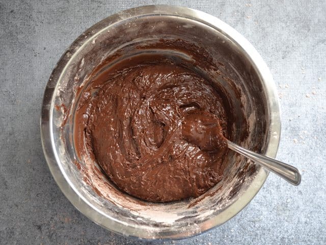 Stirred Cookie Batter in mixing bowl with fork 