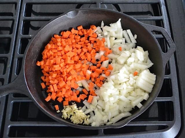 Chopped veggies in skillet to Sauté on stove top 