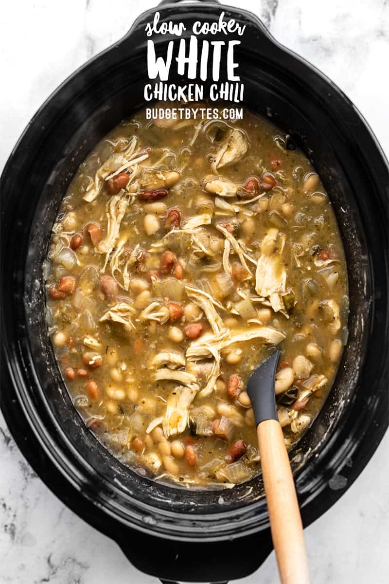Overhead view of slow cooker white chicken chili in the slow cooker