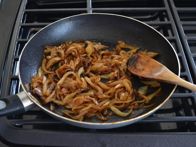 Caramelized Onions in skillet on stove top 