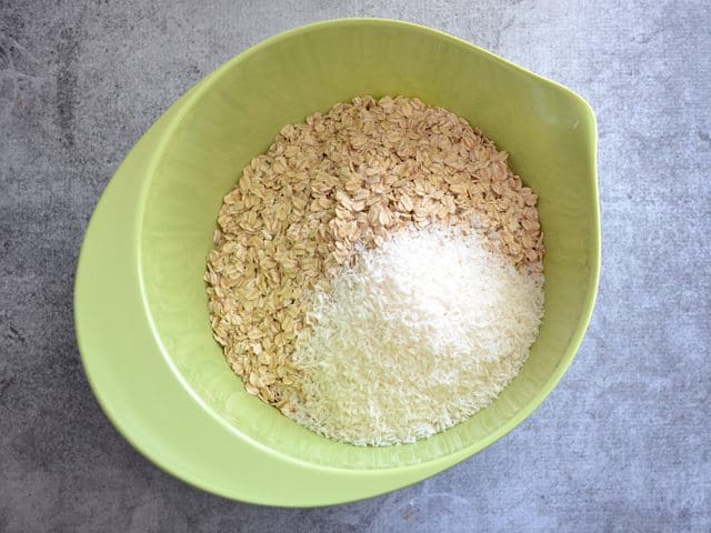 Oats and Coconut in mixing bowl 