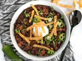 This warm and comforting black bean chili is fast enough to pull together on a busy weeknight and soothing enough to make the stress of the day melt away. BudgetBytes.com