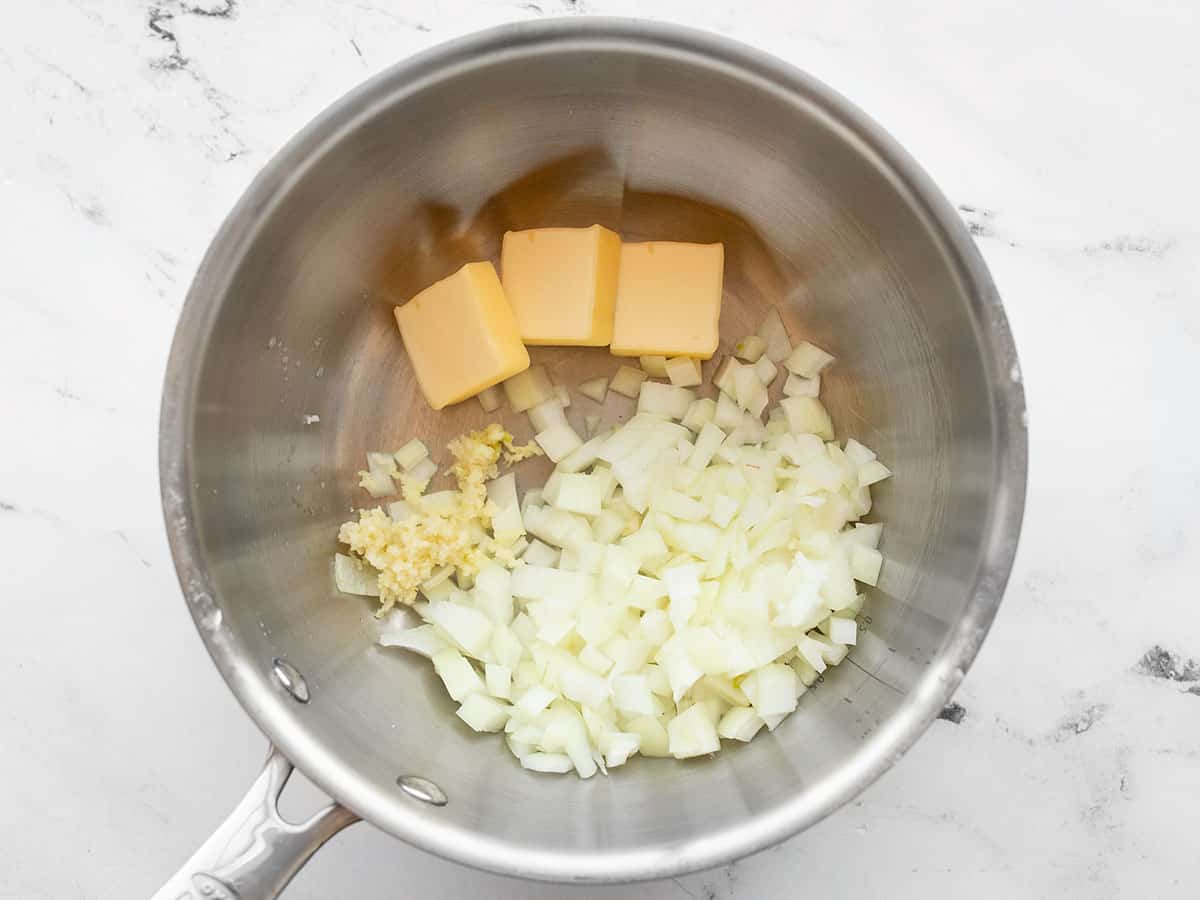 Onion, garlic, and butter in a sauce pot