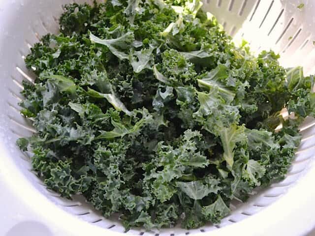 Rinsing Kale in strainer 