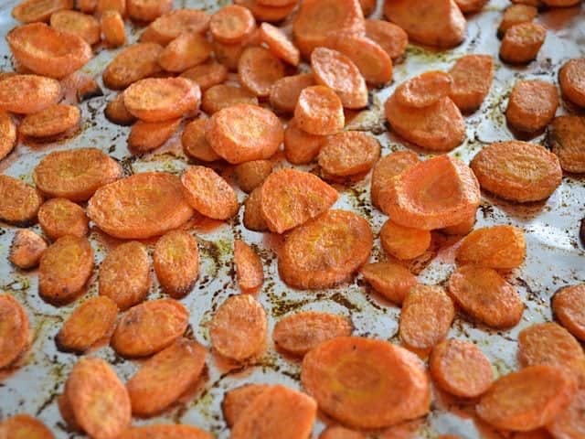 Close up of Roasted Carrots on baking sheet 