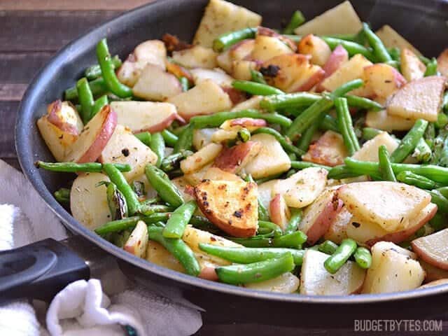 Close up of a skillet full of Skillet Potatoes and Green Beans 