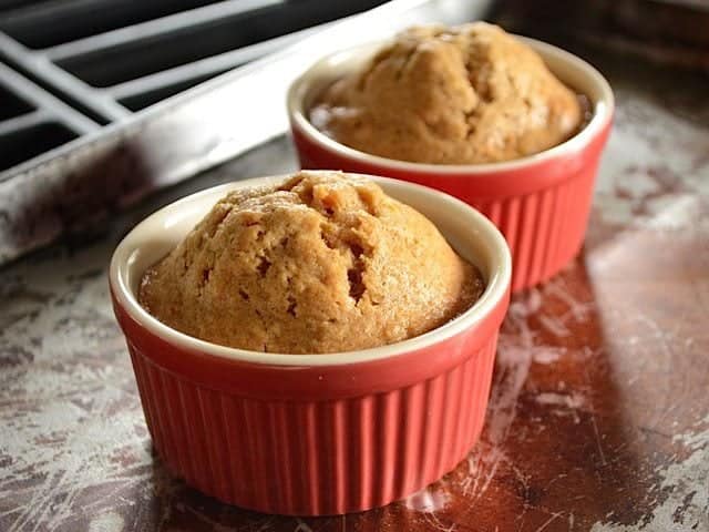 Two Baked Carrot Cakes in mini red ramekins 